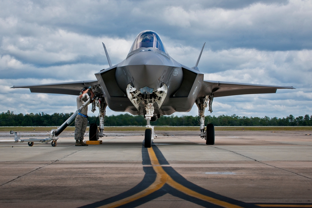 Military aircraft representing defense-sector compliance